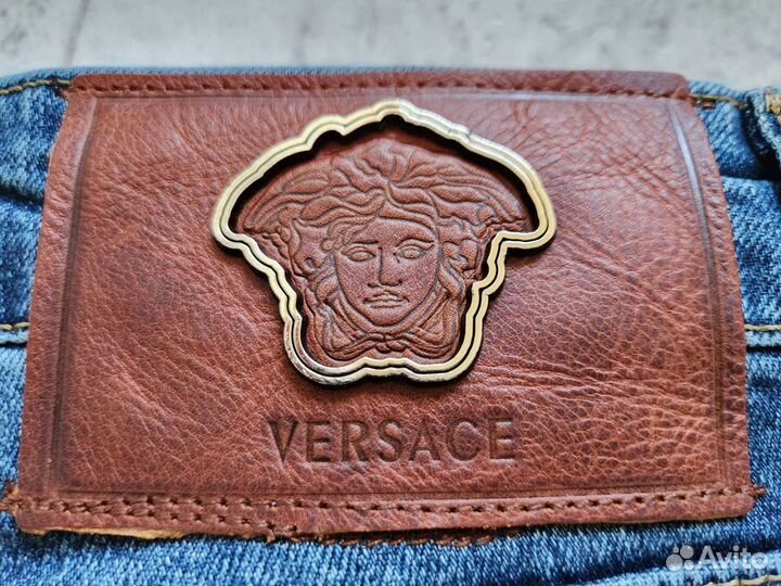 Джинсы versace