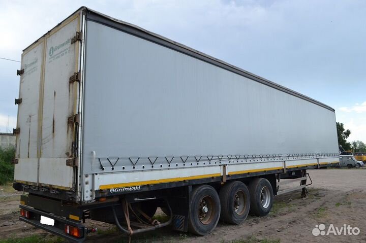 Полуприцеп шторно-бортовой Grunwald 9453-0000010-10, 2011