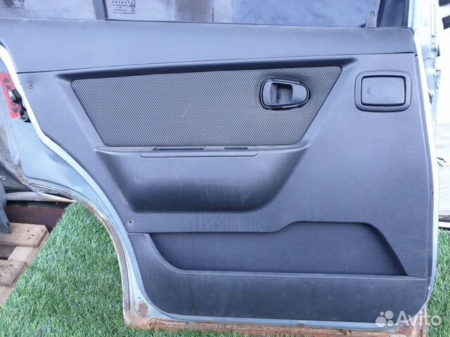 Обшивка двери задняя левая Daewoo Nexia