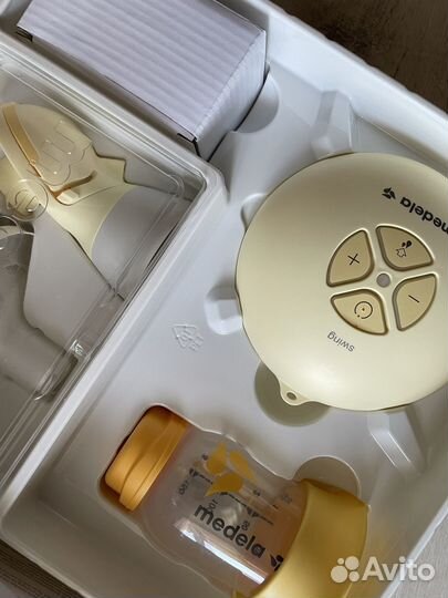 Молокоотсос medela электрический