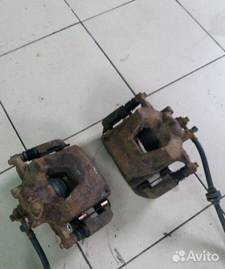 Суппорт передний Chevrolet Aveo T300