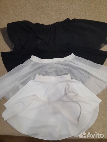 Гимнастический купальник и юбки