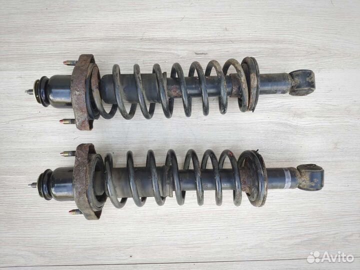 Стойка амортизатора задняя Mitsubishi Lancer IX 9