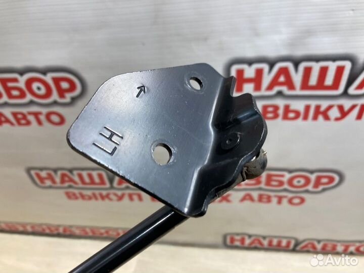 Амортизатор крышки багажника левый Nissan