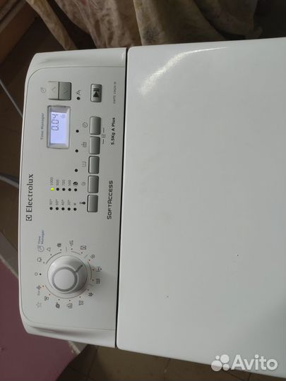 Стиральная машина с вертикальной загрузкой