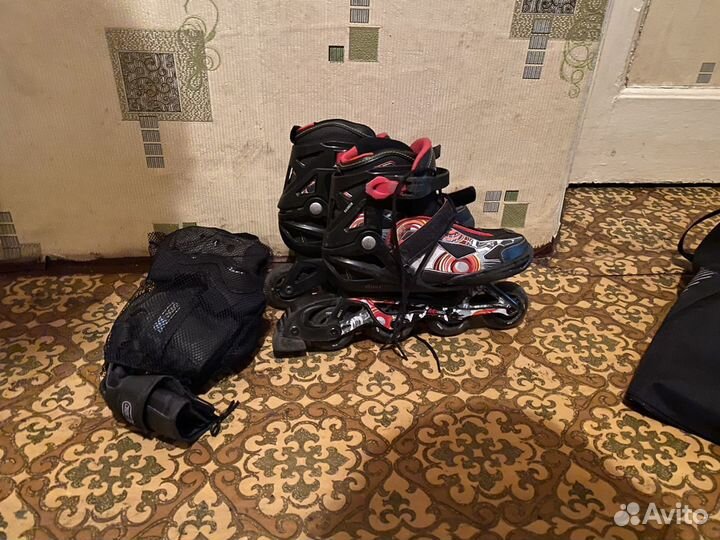 Роликовые коньки