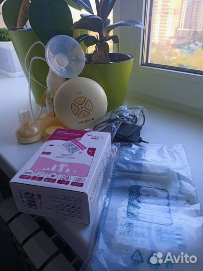 Молокоотсос medela swing электрический