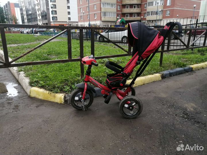 Детский трехколесный велосипед коляска
