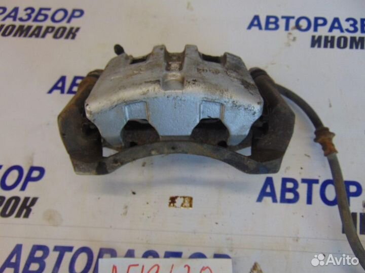 Суппорт передний левый для Nissan X-Trail 1 2001