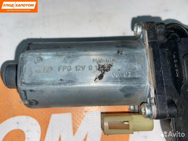 Моторчик стеклоподъемника передний левый Ford