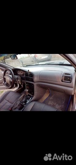 Торпеда(панель приборов) Мазда 626 2000г