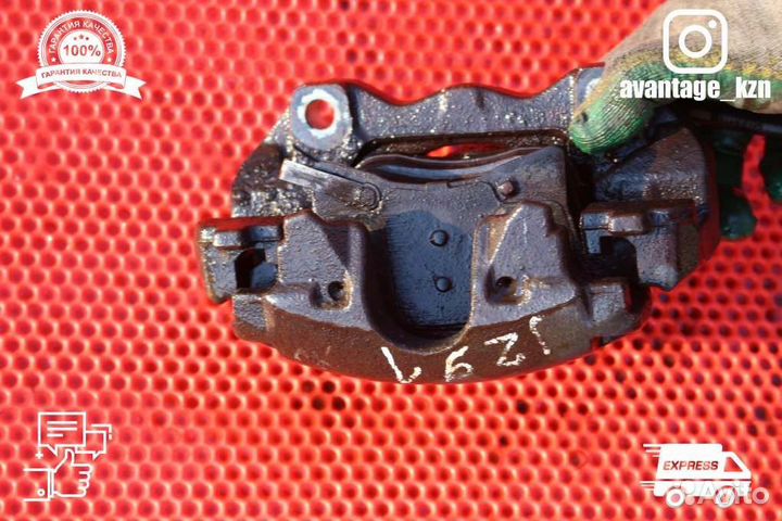 Суппорт тормозной передний правый Opel Astra H