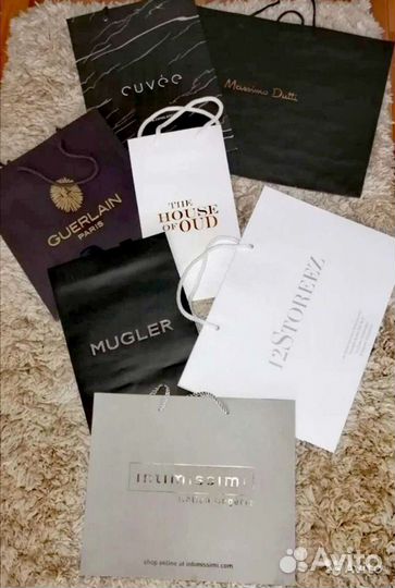 Пакеты, коробки и пыльники брендовых марок