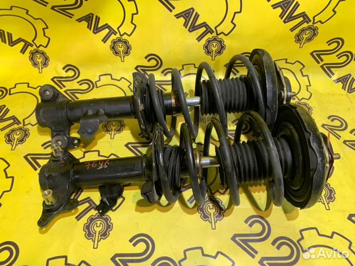 Стойки комплект передние Nissan Primera TP12