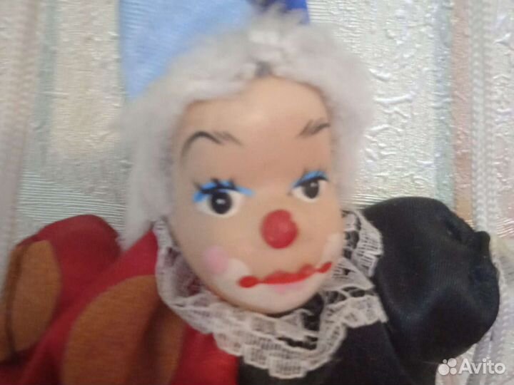 Кукла клоун на качели