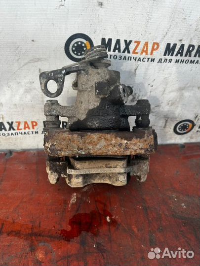 Суппорт тормозной задн. лев. Peugeot 308 2008