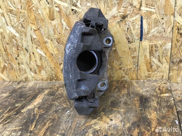 Суппорт тормозной передний правый Volkswagen Polo