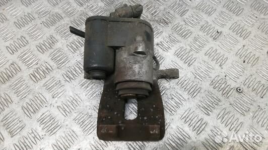 Суппорт тормозной задний левый volkswagen passat B