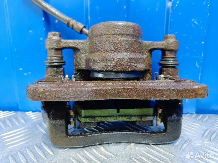 Суппорт задний левый Kia Sorento 2 XM 2.2 D4HB