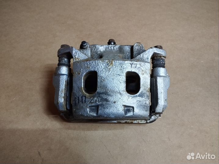 Суппорт передний правый Nissan Pathfinder R52