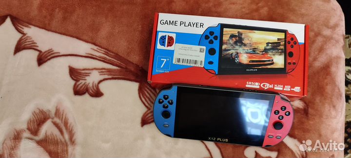 Портативная игровая приставка консоль