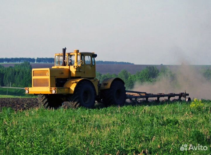 Пахота, дискование земли трактором к700, к701