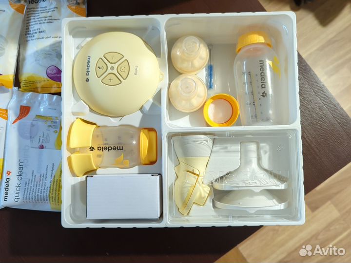 Молокоотсос medela swing flex