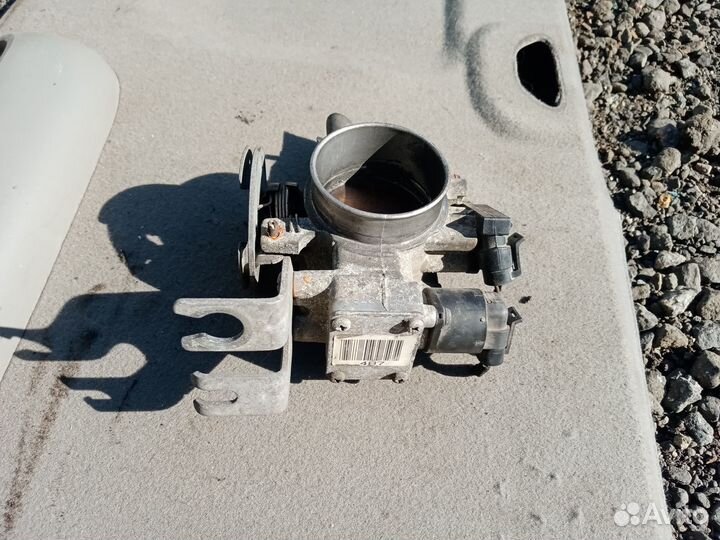 Заслонка дроссельная на Шевроле Эванда 2006