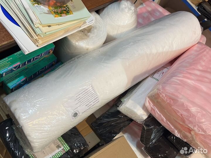 Одноразовые простыни в рулоне