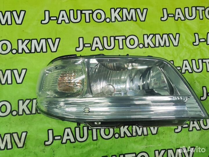 Фара Nissan Cube