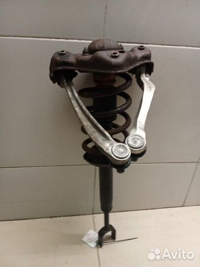 Амортизатор стойка передний левый Volkswagen