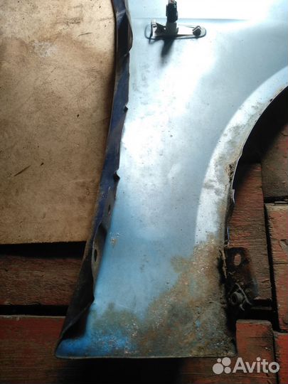 Крыло переднее левое на mitsubishi lancer 10