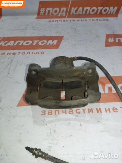 Суппорт тормозной передний правый Nissan X-Trail