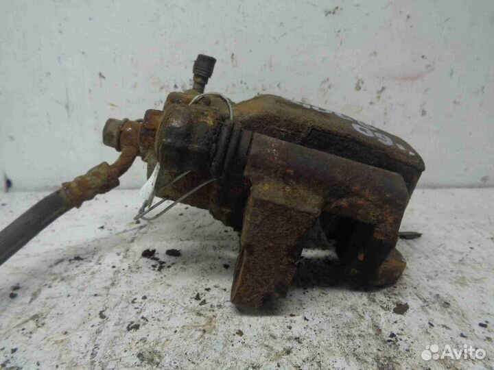 Суппорт задний левый Suzuki Grand Vitara 2 JT