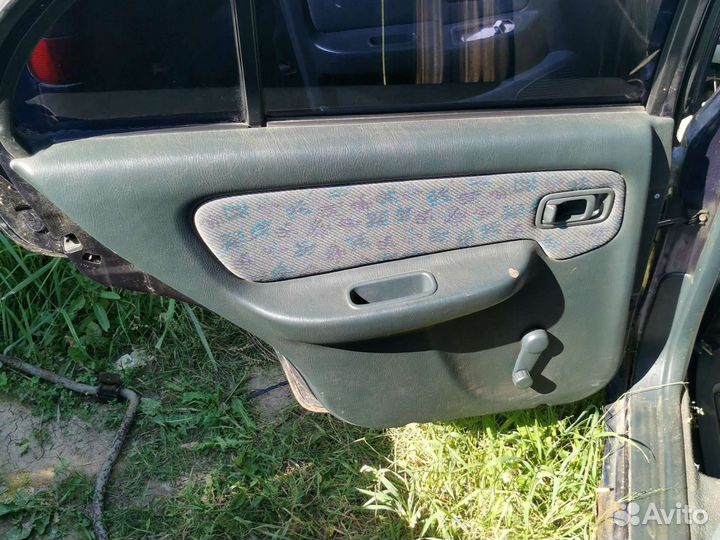 Обшивка двери ниссан альмера н15