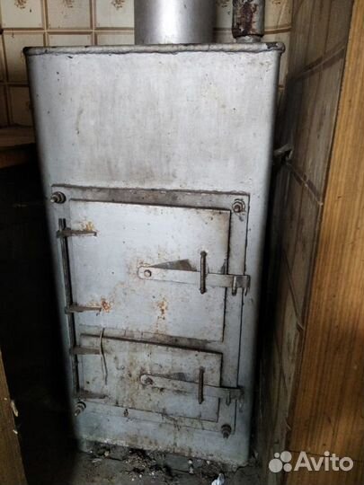 Котел на твердом топливе (система отопления )