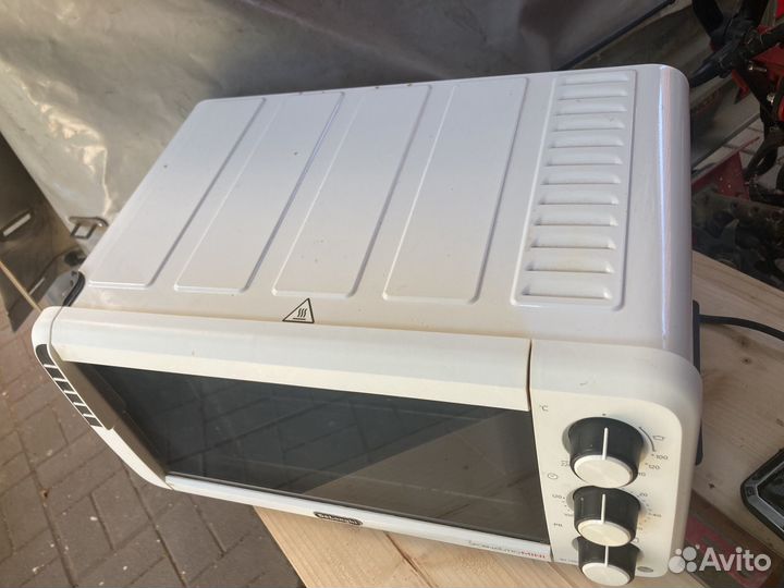 Электрическая мини печь Delonghi