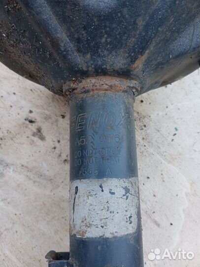 Амортизатор задний акцент