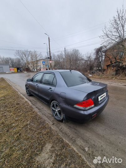 Mitsubishi Lancer 1.6 МТ, 2006, 201 000 км