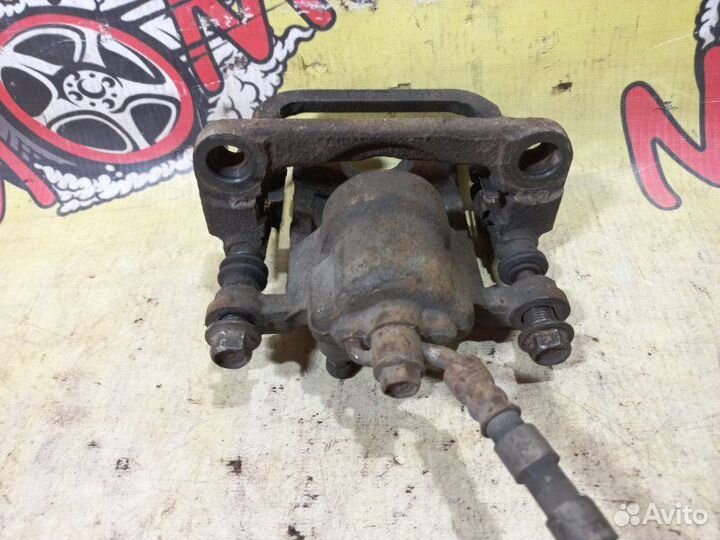 Суппорт тормозной задний правый Nissan Teana J31