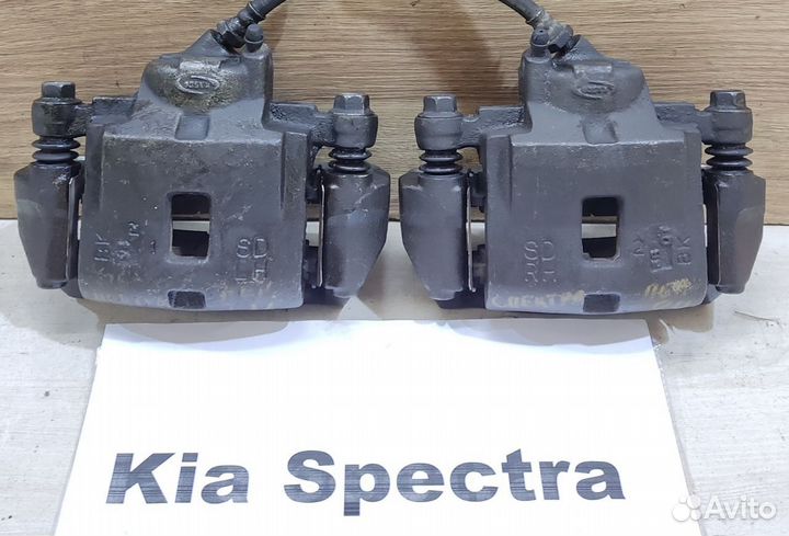 Суппорт тормозной передний Kia Spectra, 2004г