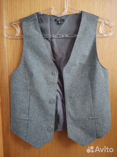 Жилетка новая