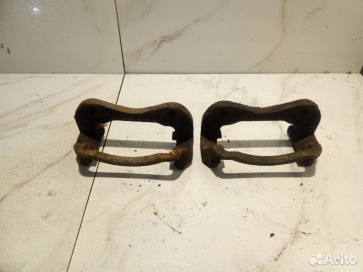 Скоба суппорта переднего Hyundai-Kia Sonata NET