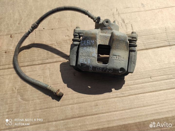 Суппорт тормозной правый Geely Emgrand ec7