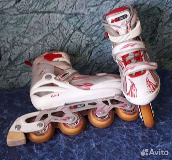 Роликовые коньки