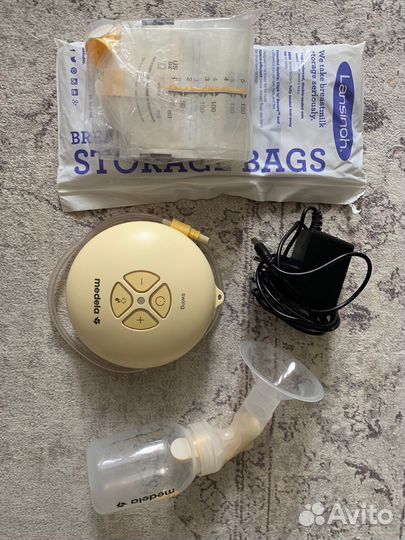 Молокоотсос medela