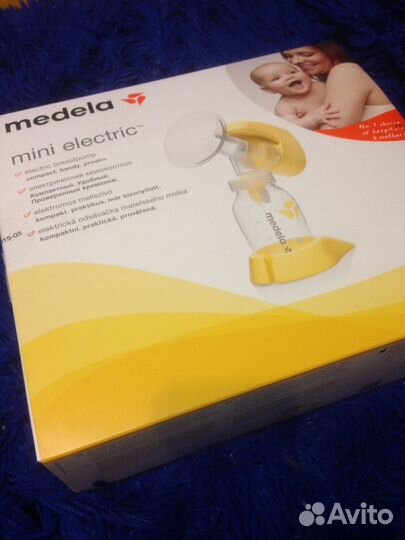 Молокоотсос Medela mini electric