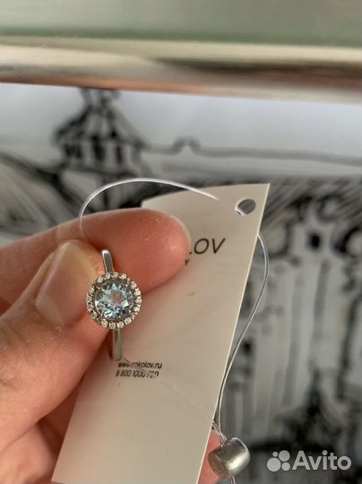 Серебряное кольцо с топазом и фианитами