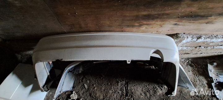 Задний бампер toyota carina AT210