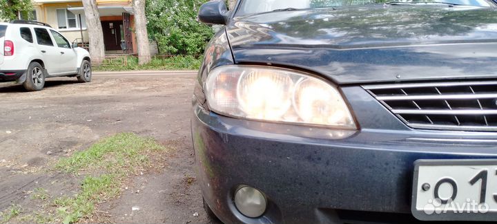 Правая фара Kia Spectra